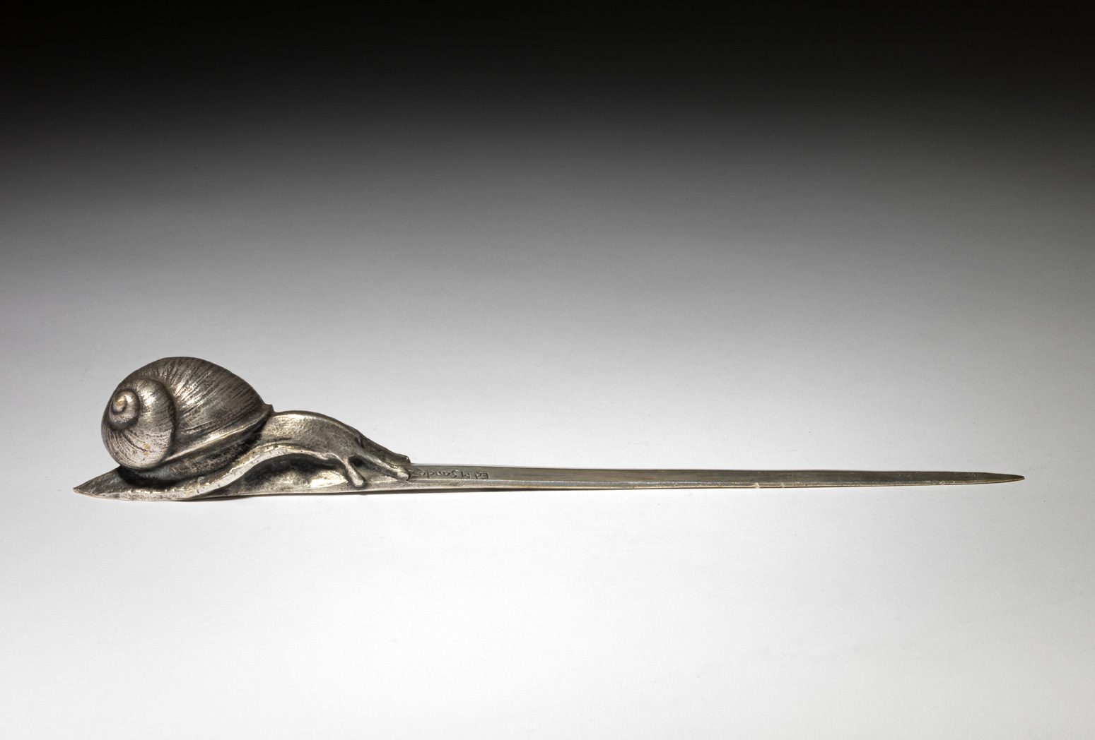 A paperknife, Snail, 1942
